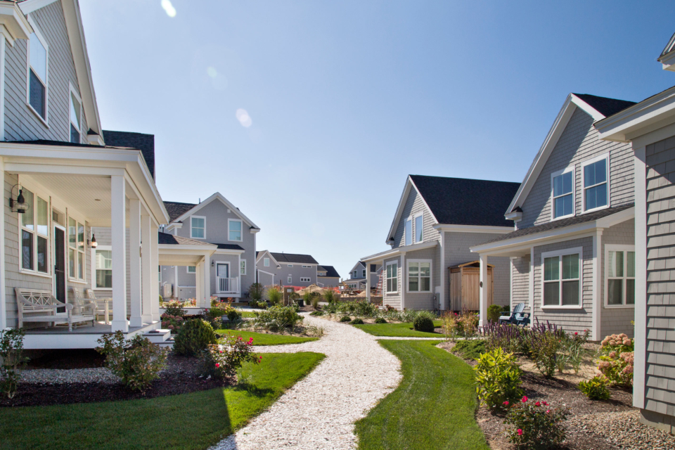 Cottage court is defined by cottage porches, landscaping, and central path.